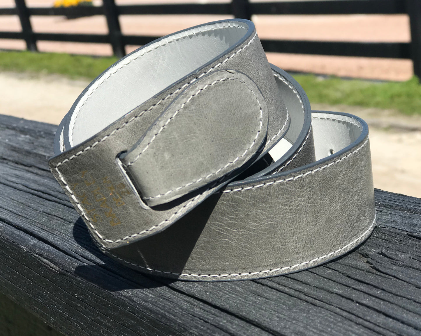 Reversible White and Gray belt.